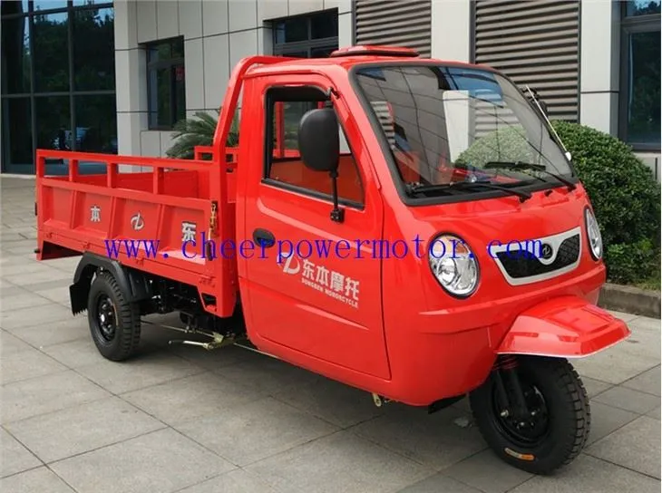 3 wou motorize granmoun devan kago tricycle